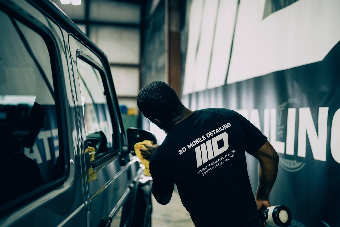 Finishing work inside the 3D Auto Detailing shop